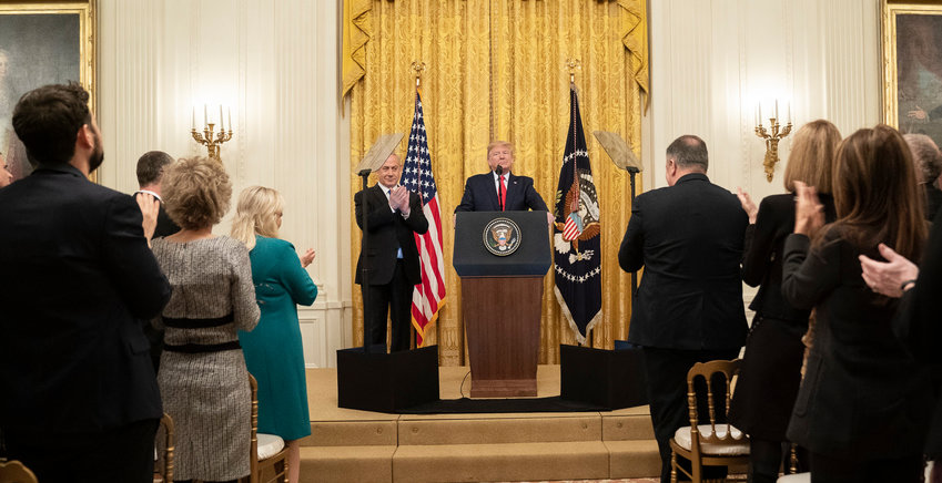 President Donald Trump delivers remarks with Israeli Prime Minister Benjamin Netanyahu on the details of the U.S. Mideast peace plan on Jan. 28, in the East Room of the White House.