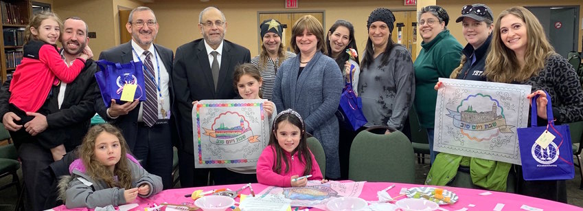Rabbi Dr. Hillel Fox (second from left), director of chaplaincy care for the North Shore University Hospital in Manhasset, was pleased with the #Giveback effort at the Young Israel of West Hempstead. Third from left: YIWH Rabbi Yehuda Kelemer.