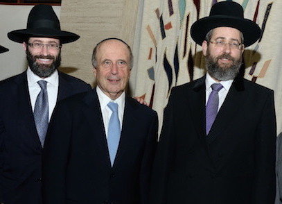 At the White Shul in 2014, Askenazi Chief Rabbi David Lau is flanked by White Shul Rav Rabbi Eytan Feiner and Lawrence Mayor Martin Oliner.
