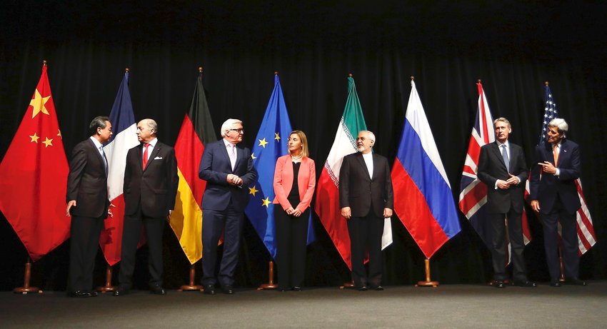 U.S. Secretary of State John Kerry (far right) poses with his P5+1 and Iranian negotiating partners in Vienna, Austria, shortly after the formal announcement of a nuclear deal between Iran and world powers.