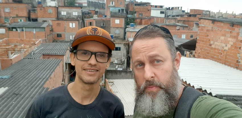 Rabbi Gilberto Ventura and a volunteer in a favela of Sao Paulo, Brazil, on May 27.