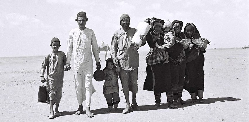 Yemenite Jewish refugees walking to a reception camp near Aden.