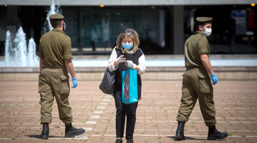 Israeli soldiers, pictured in Rabin Square on April 7, ensured compliance with the country&rsquo;s early COVID-19 lockdown. Israel enforced a moral decision to put life first, then made a political decision to reopen its economy.