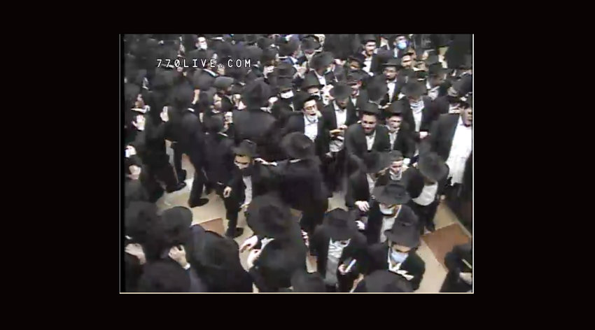 Unmasked men men, crowded into Chabad's main synagogue at 770 Eastern Parkway in Crown Heights, danced late into the night following Selichot services early on Sunday.