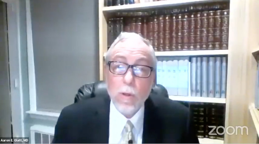 Dr. Aaron Glatt speaks during one of his motzei Shabbat COVID-19 updates on Zoom.