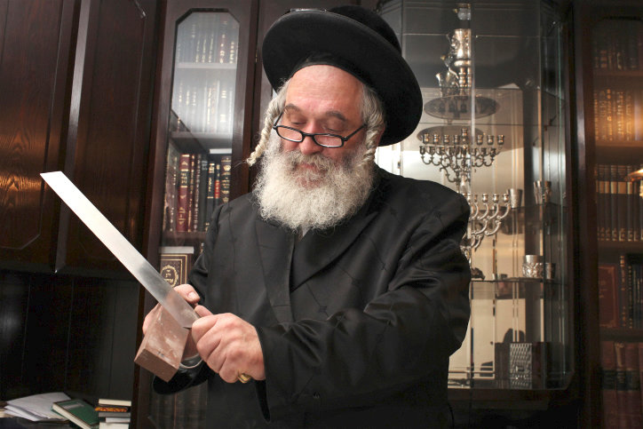 Rabbi Yitzchak Eliezer Yakav, chief slaughterer from the Chief Rabbinate of Israel, responsible for kosher slaughter of cattle imported to Israel from South America, in  2011.