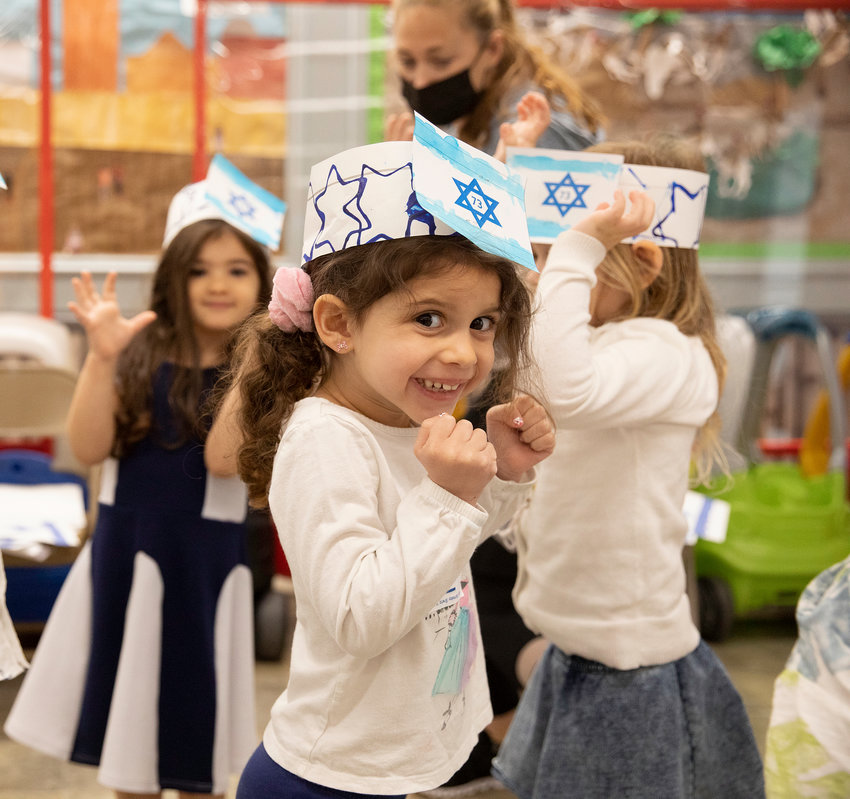 Mikaela Fligelman of Woodmere joined her HAFTR Early Childhood class in a boisterous celebration of Yom Ha&rsquo;Atzmaut.