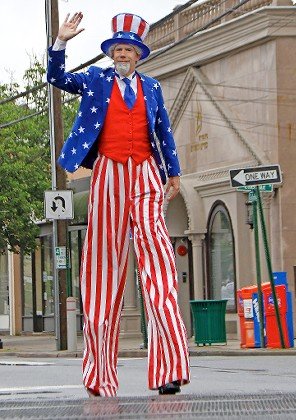 Uncle Sam looked both ways before crossing the railroad tracks on Cedarhurst Avenue, during the Cedarhurst-Lawrence Memorial Day Parade.