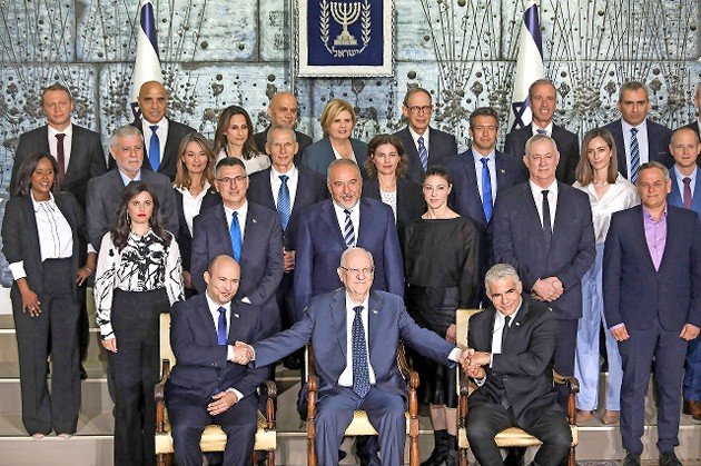 Israeli Prime Minister Naftali Bennett, Alternate Prime Minister and Foreign Affairs Minister Yair Lapid, President Reuven Rivlin and ministers pose for a group photo of the country&rsquo;s 36th government, at the President&rsquo;s Residence in Jerusalem on June 14.
