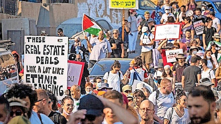 Demonstrators on July 30, 2021, protest Israel&rsquo;s plan to demolish certain houses in the eastern Jerusalem neighborhood of Sheikh Jarrah.