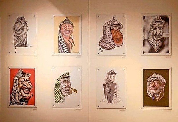 Caricatures of the late PLO leader Yasser Arafat in the new Yasser Arafat Museum in Ramallah in January.