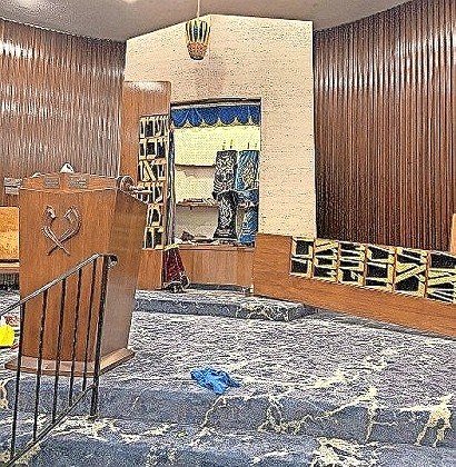 Torahs were removed, the aron kodesh vandalized, and religious objects strewn about, at Chabad of the Beaches last August.