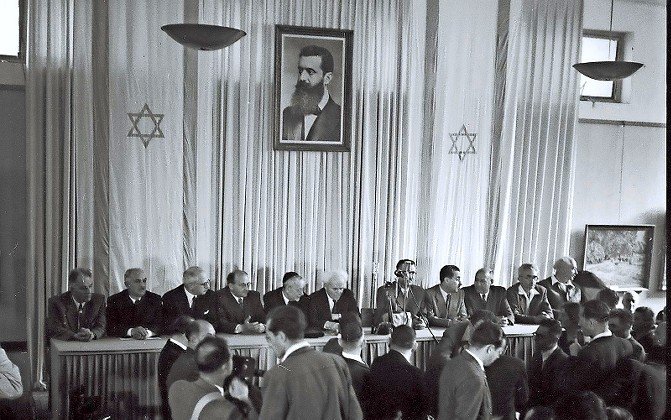 The drapes hanging behind Israel&rsquo;s leadership were put in place to cover nude paintings, and the portrait of Herzl and the flags were a quick loan.