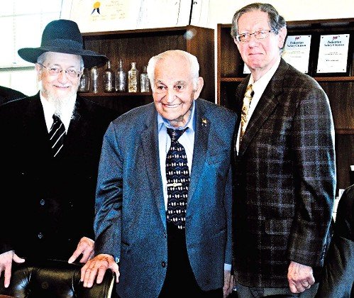 The late Mayor Andrew Parise of Cedarhurst, who was among America troops who liberated Buchenwald, is flanked by Rabbi Yaakov Feitman of Kehillat Beit Yehudah Tzvi in Cedarhurst and The Jewish Star Kosher Bookworm columnist Alan Jay Gerber, in 2014.
