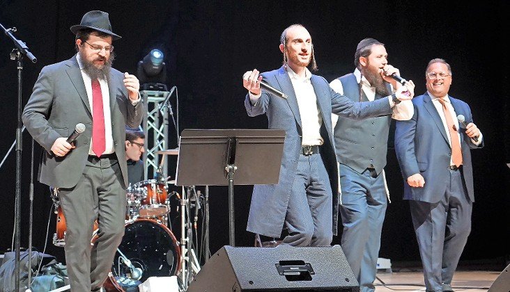 At CAHAL's Lawrence HS concert (from left) Benny Friedman, Shulem Lemmer and Joey Newcomb. The show&rsquo;s producer, Shloime Dachs, is at right.