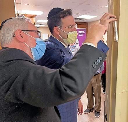 Rabbis Glatt and Bender capped the event by affixing a mezuzah to the room&rsquo;s entrance.