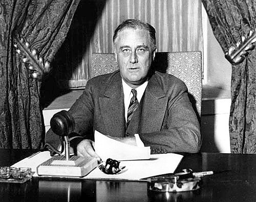 President Franklin D. Roosevelt prepares to begin his first fireside chat to the American people in this March 12, 1933.
