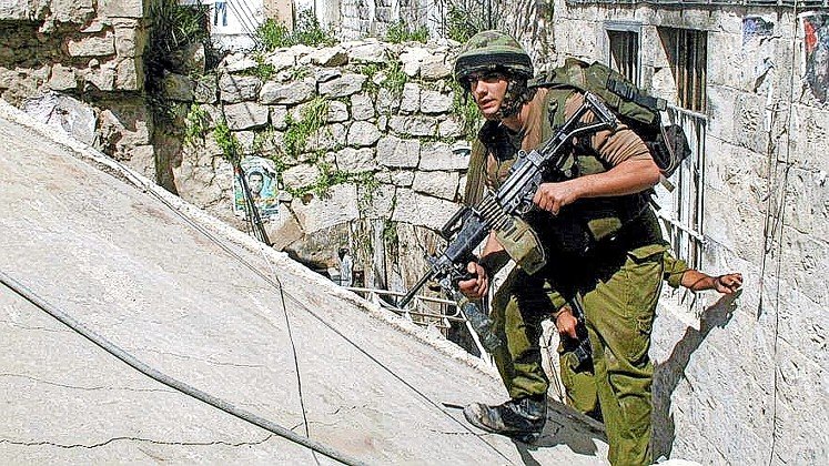 An Israeli soldier in Jenin in April 2002.