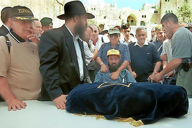 The funeral of 10-month-old Shalhevet Pass, who was shot at close range by a Palestinian terrorist during the Second Intifada on March 26, 2001.
