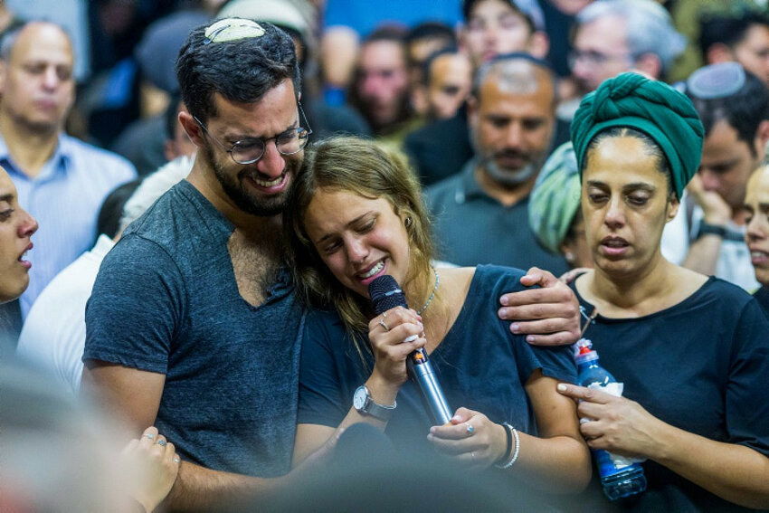 Friends and family attend the funeral in Moshav Yesodot of 21-year-old Harel Masood, who was killed in a terror attack near the near the Jewish community of Eli, June 20, 2023.