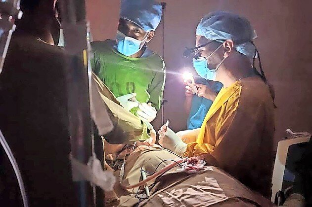 Israeli and Ethiopian doctors operate on a three-year-old child during a power failure at the St. Peter&rsquo;s Hospital in Addis Ababa, Ethiopia.