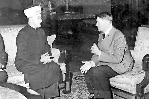 Grand Mufti of Jerusalem Haj Amin al-Husseini (left) meets with Adolf Hitler in 1941.