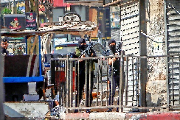 Terrorists in Jenin on July 3.