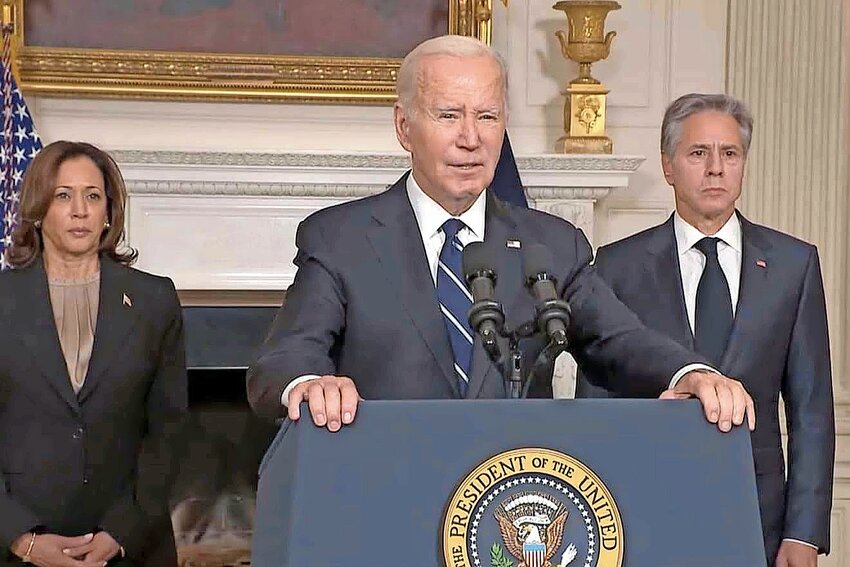 President Joe Biden, flanked by Vice President Kamala Harris and Secretary of State Antony Blinken, delivers strongly-worded support for Israel in a televised address on Tuesday afternoon.