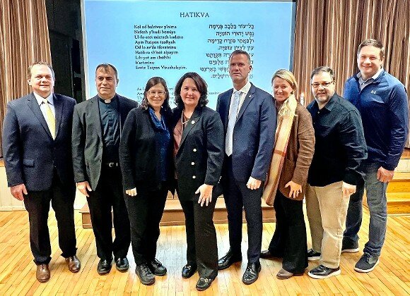 Members of the Malverne village board attended an interfaith rally at Our Lady of Lourdes to express their solidarity with those who are grieving. They pledged support to the Jewish community, including deploying the Malverne police if needed. At center: State Sen. Patricia Canzoneri-Fitzpatrick.