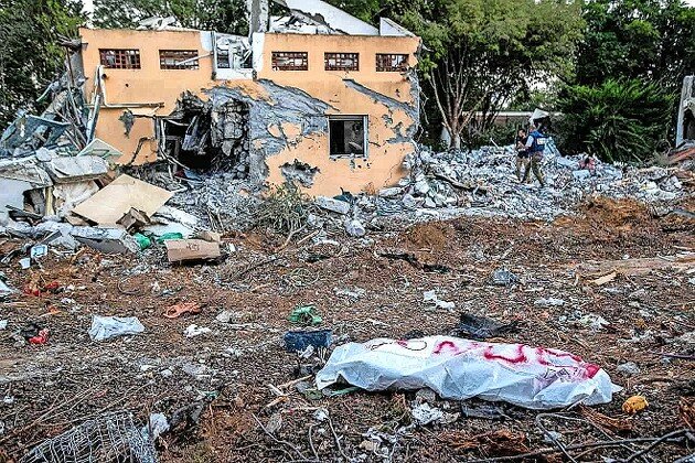 Destruction wrought by Hamas, pictured days later, in Kibbutz Be&rsquo;eri.