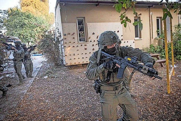 Israeli counter-terror forces patrol in Kibbutz Be&rsquo;eri, near the Israeli-Gaza border in southern Israel, on Oct. 22.