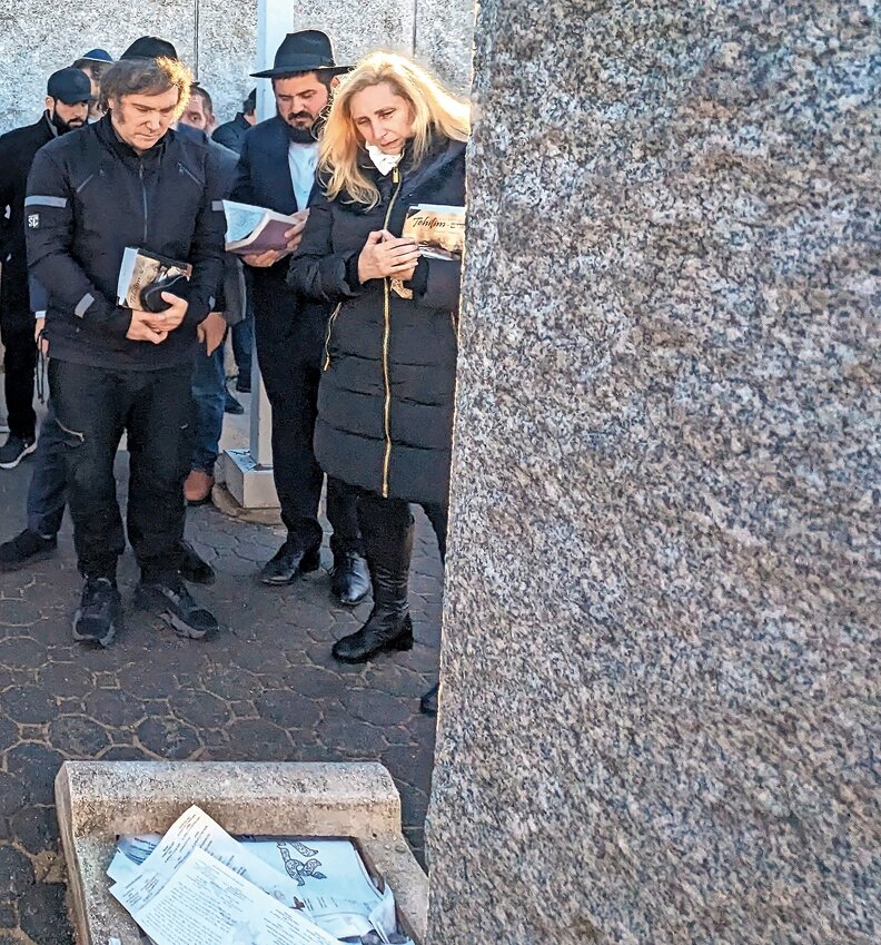 President-elect Javier Milei of Argentina and his sister, Karina Milei, pay their respects at the resting place of Rebbetzin Chaya Muska Schneerson after praying at the resting place of the Rebbe.