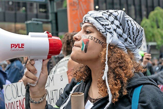 A supporter of the Oct. 7 Hamas attack on Israel at a rally in New York City on Oct. 9.