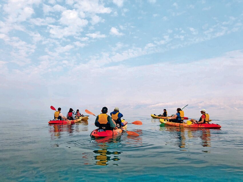 Tourist kayaking on the Dead Sea in Israel.