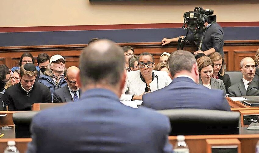 Claudine Gay (center), the president of Harvard University, testifies during a House committee hearing about antisemitism on campus on Dec. 5, 2023.