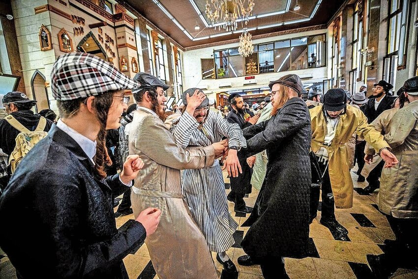 Jews celebrate Purim at a yeshiva in Jerusalem&rsquo;s Mea Shearim neighborhood last March.