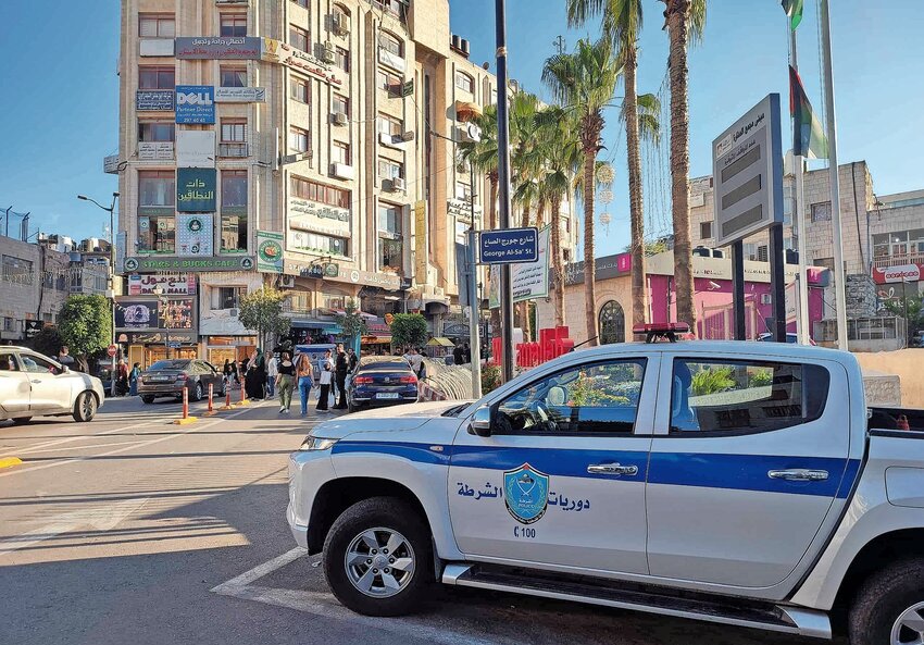 A Palestinian police car in Al-Manara Square in Ramallah.