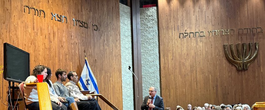 Rabbi Ira Ebbin, right, spoke last week to a panel at Congregation Ohav Shalom that included Shani Goren and Omar Vehab. Both survived the Oct. 7 attacks by Hamas in Kibbutz Nir Oz, near the Gaza border.