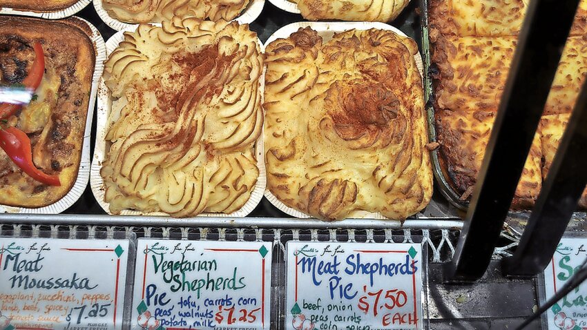 Vegetarian and meat Shepherd&rsquo;s Pie for sale at the Granville Island Public Market in Vancouver.