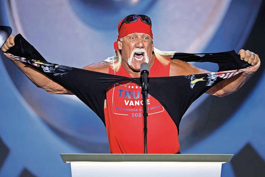 Hulk Hogan rips his shirt as he speaks on stage on the fourth day of the Republican National Convention.