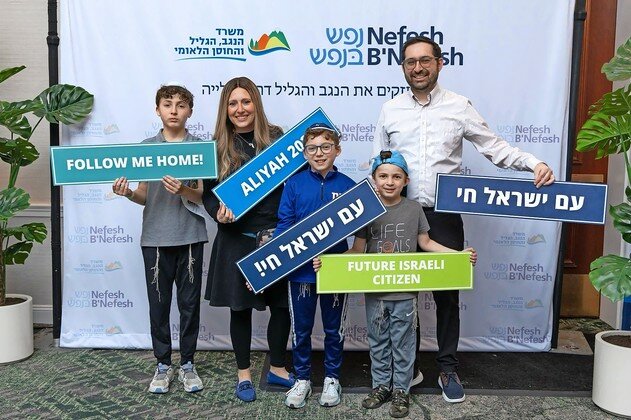 The Daniel and Ilana Krausz family from Springfield, NJ, visited the Aliyah Fair in anticipation of their aliyah this summer.