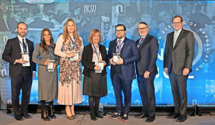 At the OU&rsquo;s Biennial Convention and Evening of Appreciation, from left: New OU Board of Directors members Natan Bane, Ahuva Basch, Aliza Bixon, Miriam Greenspan, and Josh Goldberg; OU President Mitchel Aeder, and OU Chairman of the Board of Directors Yehuda Neuberger.