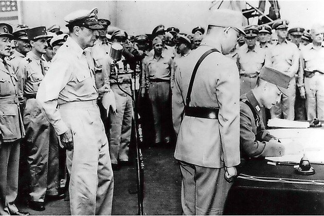 Japan surrenders to Allied Forces, ending World War II in 1945.