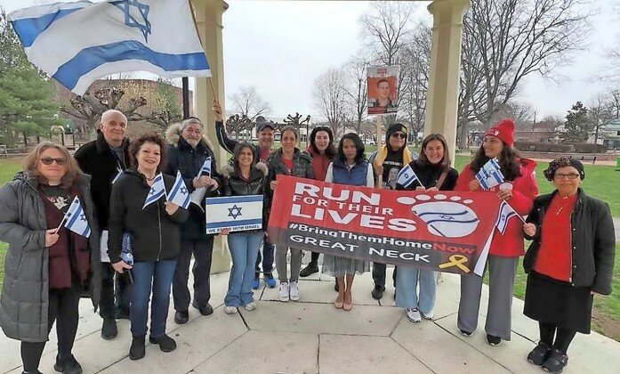 Nassau Legislator Mazi Pilip joined community members at the Gazebo in Great Neck&rsquo;s Village Green on Sunday for a Run For Their Lives. Among those pictured: Dr. Andrew Zeidman, holding the Omer Neutra HYD sign, and Dr. Paul Brody, LI and Queens president of the ZOA.