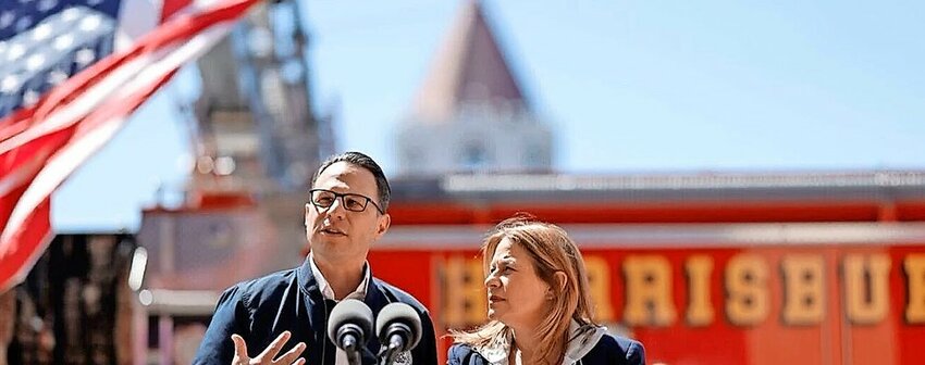 Pennsylvania Gov. Josh Shapiro and his wife Lori Shapiro speak to reporters outside a Harrisburg fire station after serving lunch to thank firefighters who responded to the arson attack at the governor&rsquo;s mansion on April 17.