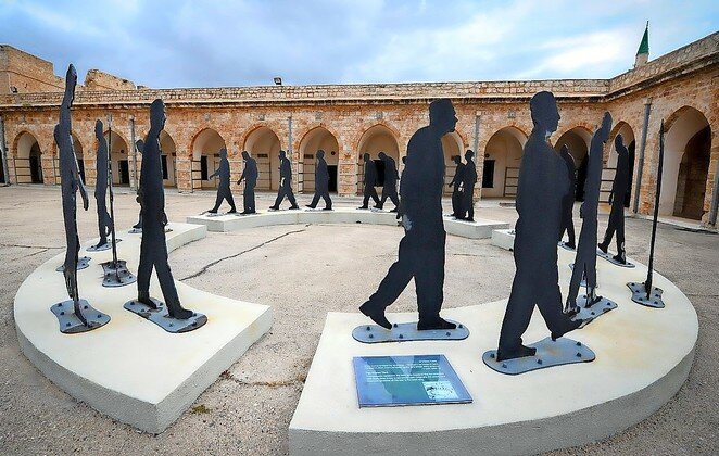 Acre Prison, a former prison and current museum in the port city in northern Israel. The citadel was built during the Ottoman period over the ruins of a 12th-century Crusader fortress. The Ottomans used it at various times as a government building, prison, army barracks and arms warehouse. Photographed in 2016.