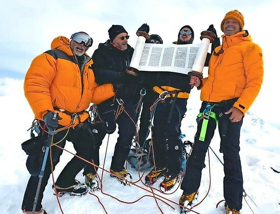 Minyan Everest climbers with their Torah scroll atop Mera Peak in northeastern Nepal on May 6.