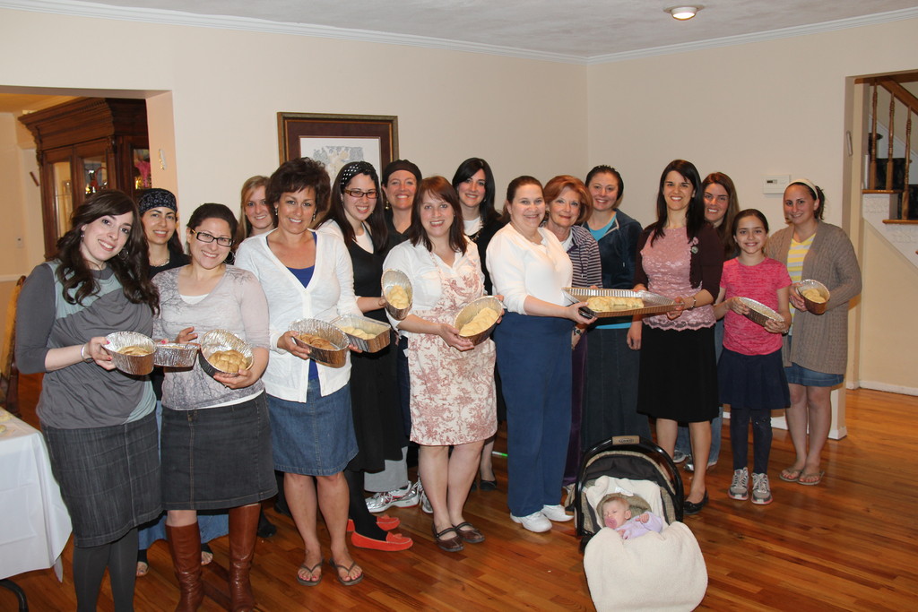There are always opportunities that come up in life that can be turned into acts of chessed.  On the evening of April 19, 2012  a group of 15 women and young girls gathered at the home of Shoshy Skolnick of North Woodmere.   They all enjoyed a class on challah making as well as having the opportunity to make their own shlissel  (key) challah.  This special custom requires the putting of ones house key to be baked into challah for the first shabbos after Pesach.  The idea is that just as you rid your house of all chametz for Pesach, one has faith that Hashem will once again fill their home with food for the coming year.
     Everyone enjoyed the evening and was excited to be baking their own challahs and filling up their homes with the smell of shabbos.  That evening, over $350 was raised as tzaddakah for the refuah of a small boy in the Five Towns.  The  tzaddakah raised was distributed to Chai Lifeline and its I-Shine program,an after school program, that helps to relieve and give support to families with sick children. Shoshy Skolnick read books to the children at The Blue Door the following week.
