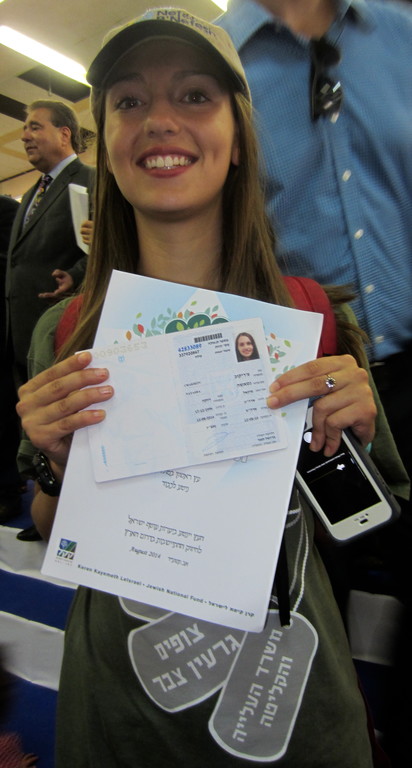 Natasha Kaplan-Marans proudly displays her
Israel Identity Card as a new olah in Israel.