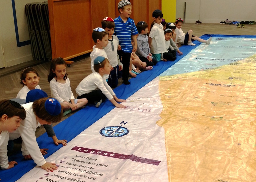 HANC Elementary Yom HaAtzmaut: Students at the West Hempstead school prepared to walk this giant floor map of Israel, all the way from Eilat to the Golan Heights.